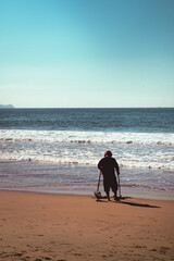 Naklejka premium walking on the beach