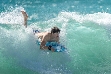 surfing on the beach in hawaii 