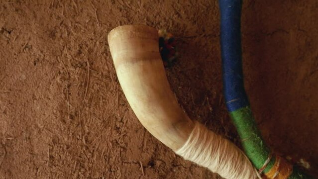 Culture and history. Closeup view of an autochthonous Mapuche musical instrument, &radic;&euml;olkin. It belongs to the family of the trumpets and is made with wood and animal guts.