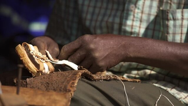 Wood Carving. Carver With Chisel And Hammer