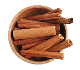 Aromatic cinnamon sticks in bowl isolated on white, top view