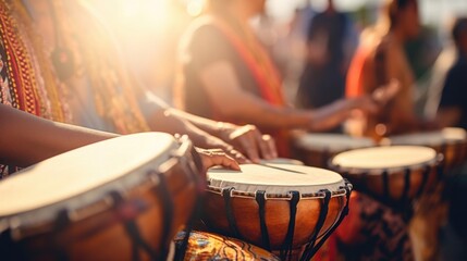 Closeup of traditional instruments being played at a music festival. - obrazy, fototapety, plakaty