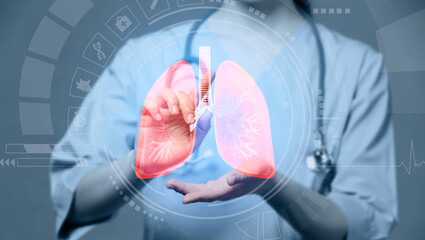 Female doctor using virtual screen with picture of lungs