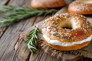 Herbed cream cheese on a rustic wood table with a delicious bagel