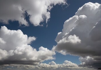 Obraz premium Fluffy Clouds in a blue sky from Generative AI