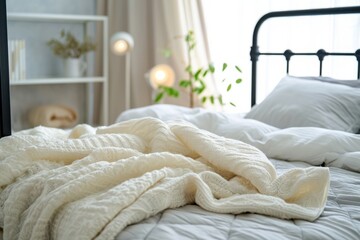 Fototapeta na wymiar Close up of white bedding on iron frame with mattress