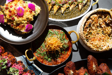 Table full of Indian dishes