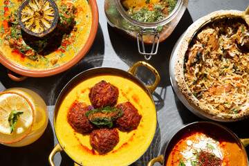Table full of Indian dishes