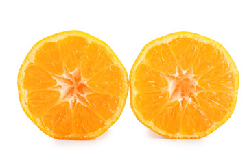 Halves of fresh tangerines on white background