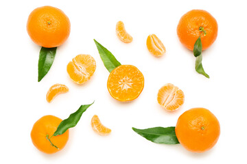 Many sweet mandarins with leaves on white background