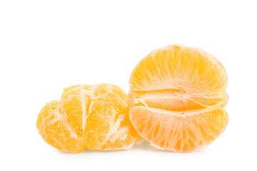 Halves of sweet mandarin on white background