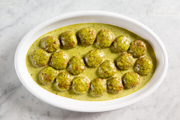 Meatballs in vegetable sauce