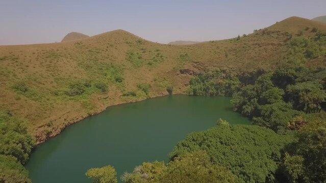 Flying a drone over a lake in the Melong region, Cameroon