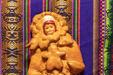 image of a human face made of bread, as an Aymara cultural manifestation