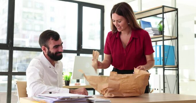 Managers colleagues order food delivery to office