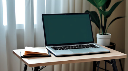 Laptop and book stand on table at home, e-learning, online learning