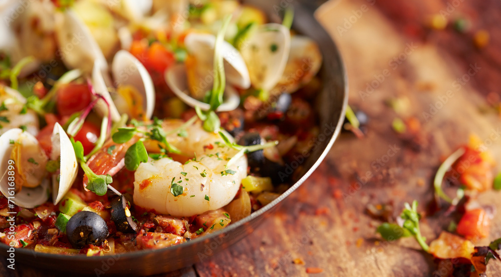 Sticker Stir-fried clams and shrimp seafood in a pan