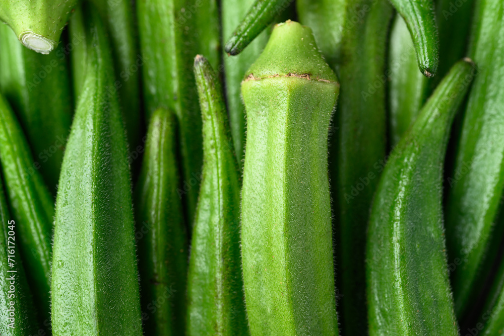 Wall mural fresh green okra pattern texture background, organic vegetables