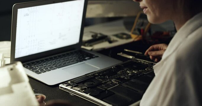 Motherboard, laptop and woman repair hardware, electronics or problem solving semiconductor at night. Garage, tech workshop or IT expert fixing computer system, circuit or PC with mockup screen space