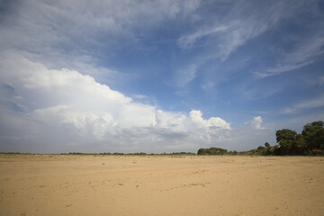 clouds over the beach