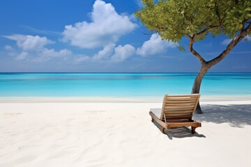 Fototapeta na wymiar Relaxing on a pristine beach in the Maldives.