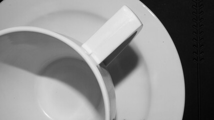 A photograph of a cup and saucer.