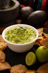 Guacamole. Avocado dip sauce,  one of its many ways of consuming it is spread on tortilla chips also called Nachos. Mexican easy homemade sauce recipe very popular.