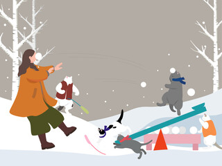 Playing with cats on a snowy day
