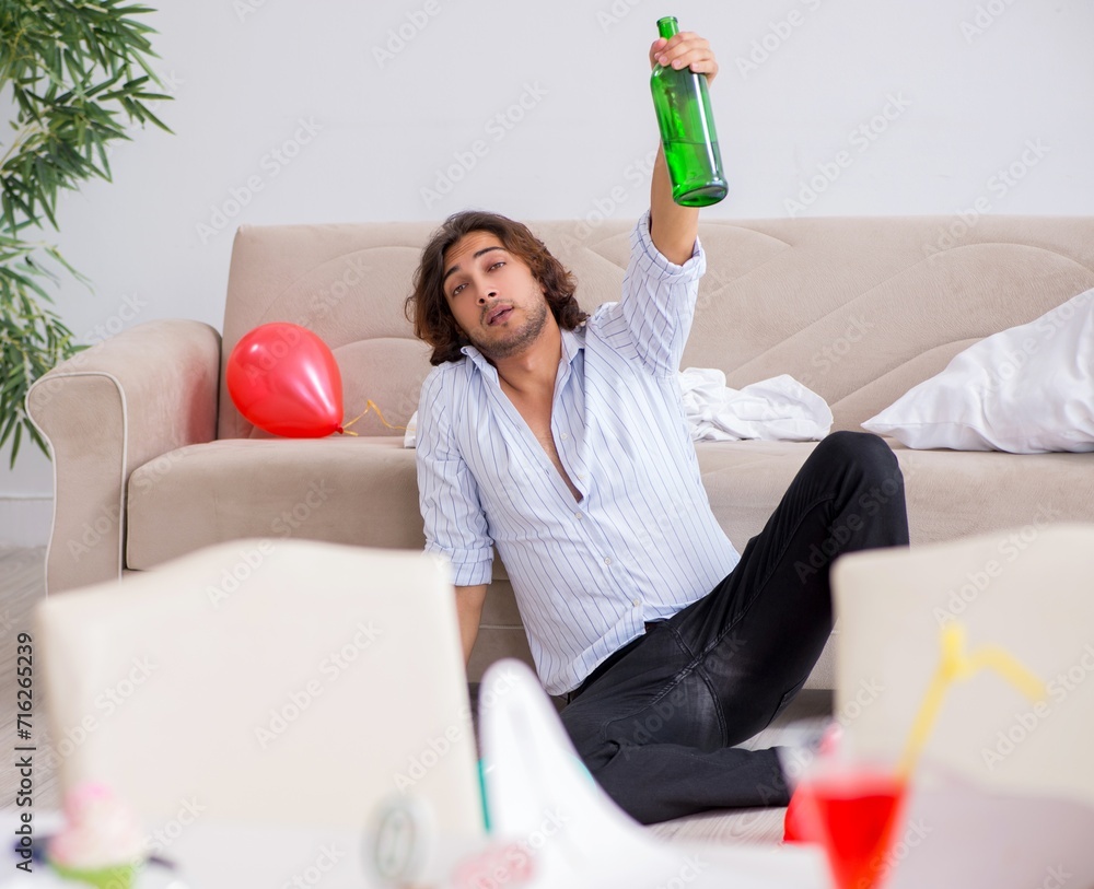 Poster Young man celebrating his birthday at home