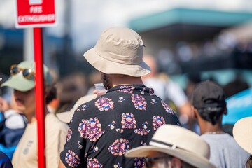 australian open crowds watching tennis matches on a hot summer day