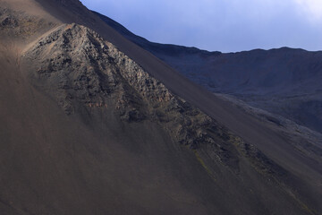 Fototapeta premium partially sunlit mountain side in Iceland