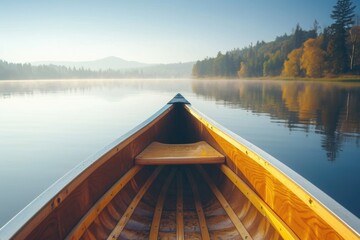 Bow of a canoe on a lake, sunny morning - obrazy, fototapety, plakaty