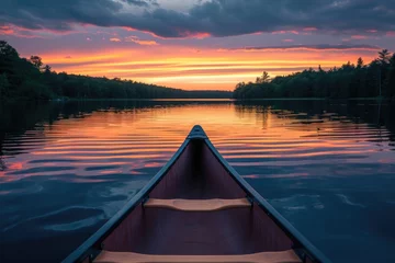 Foto op Canvas Bow of a canoe on a lake at sunset © Дмитрий Баронин