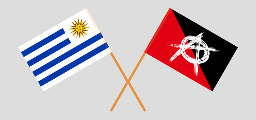 Crossed flags of Uruguay and anarchy. Official colors. Correct proportion
