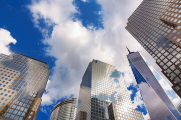 New York skyscrapers, modern office buildings in business district against blue sky bottom view, New York city skyline, USA
