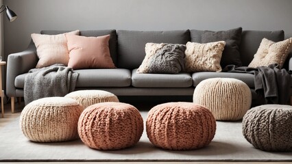 a cute cat in A modern twist on traditional knitting techniques, these poufs add a touch of texture and warmth to the clean lines of a Scandinavian living room, creating a cozy and inviting space - obrazy, fototapety, plakaty