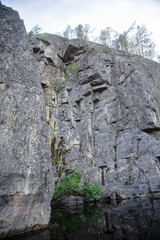 Stone rocks in the sea. Rocky terrain. The Cave in Marble. The Cave in Marble