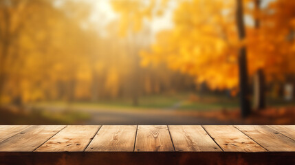 Naklejka na ściany i meble The empty wooden table top with blur background of autumn. Exuberant image.