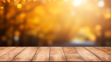 The empty wooden table top with blur background of autumn. Exuberant image.
