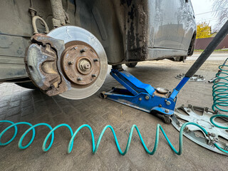 A brake disc on a removed car wheel