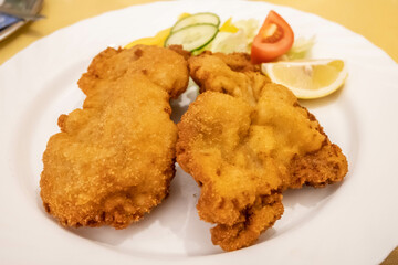 Traditional Wiener Schnitzel meal in Vienna, Austria