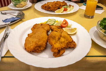 Traditional Wiener Schnitzel meal in Vienna, Austria