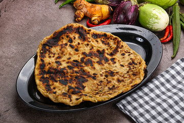Indian cuisine stuffed Aloo paratha