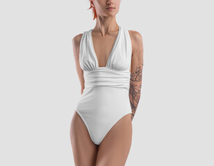 Mockup of women beach white swimsuit on slender girl, luxury swimwear, front view, isolated on background.