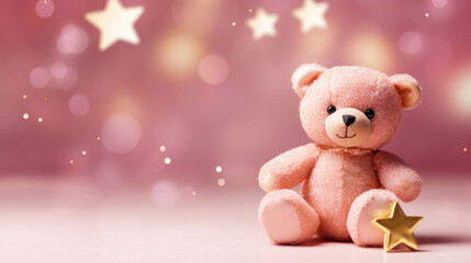 A soft pink teddy bear alongside a golden star with a dreamy pink bokeh effect in the background.