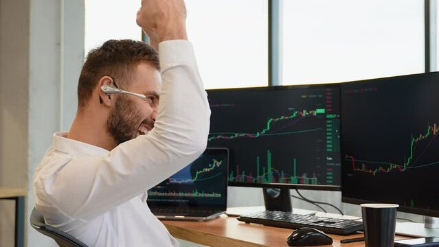 Trader celebrates a successful deal on stock market. Trader celebrate the adoption of Bitcoin ETF