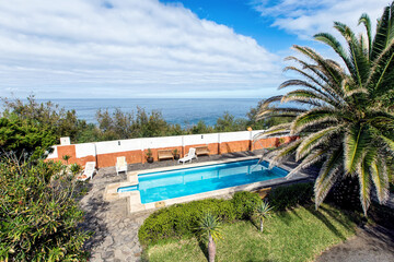  view of swimming pool by sea against sky (La Palma, Canary Islands, Spain)