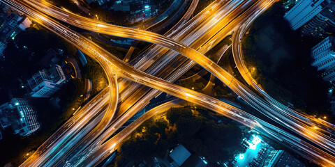 Expressway top view, Road traffic an important infrastructure, car traffic transportation above intersection road in city night,