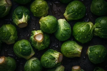 Foto op Aluminium Fresh brussel sprouts with water splashes and drops on black background © Canities