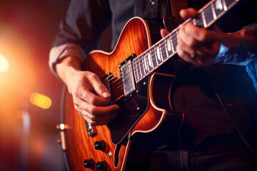 Guitar player performs on stage. Rock guitarist plays solo on an electric guitar.